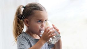 child drinking water 10 Way to reduce stress naturally